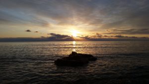 photo of sunrise over lake